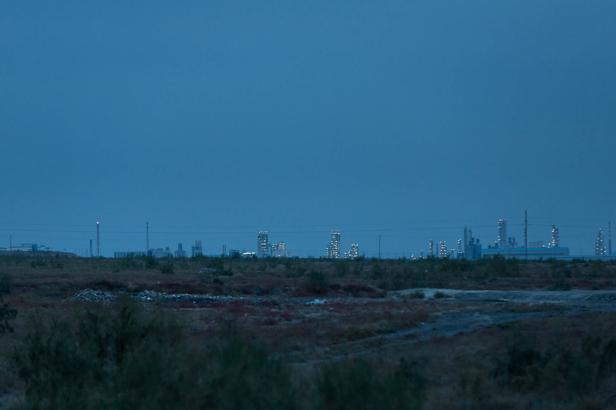 oil refineries in the distance