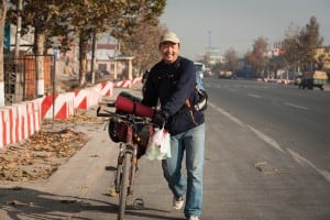 Zhu Hui pushing my backback on his bike