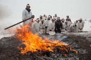 Traditional burial in the countryside. The mourning wreaths are being burned.