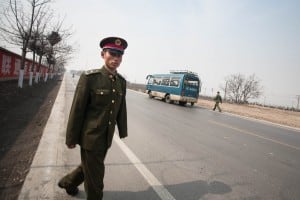soldier and bus