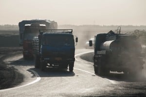 trucks on a curvy road