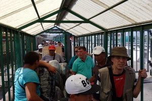 people waiting to cross into Kazakhstan