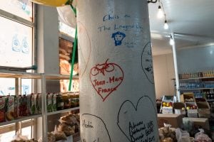 signed pillar in a shop