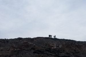 people on a hill