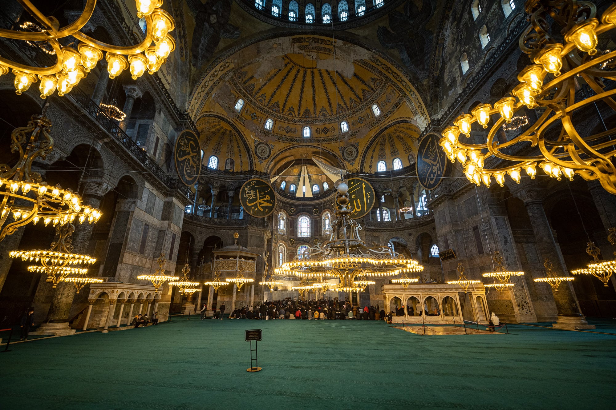 Small group of praying men in the Hagia Sophia