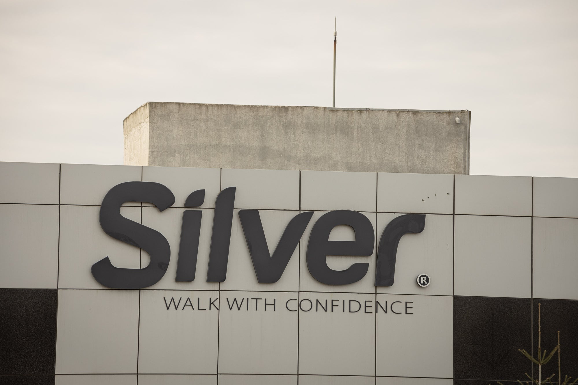 Silver - Walk With Confidence factory sign
