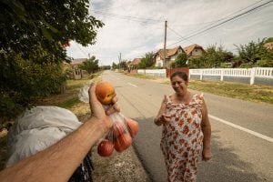 this lady gave me some tomatoes and a peach