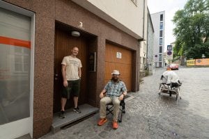 I sit with my friend and web designer Mario outside of Studio Mitte in Linz.
