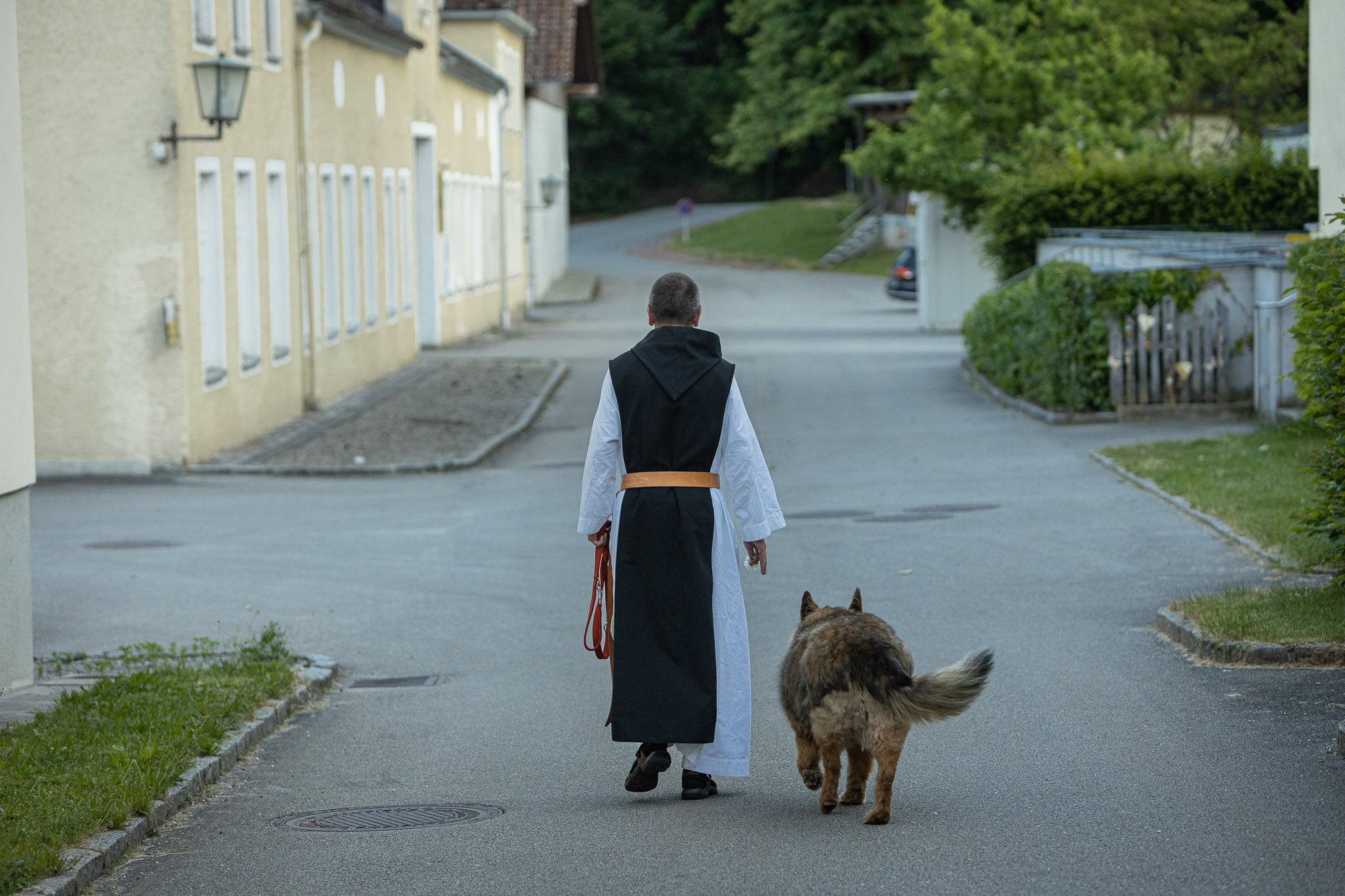 Pater Christian with Dante the dog