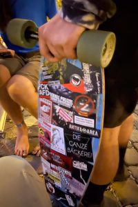 skateboard with stickers in the Climate Camp Augsburg
