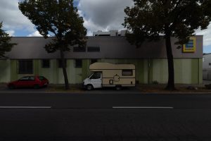 mobile home in front of a supermarket in Speyer