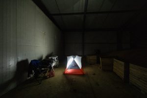camp in a barn
